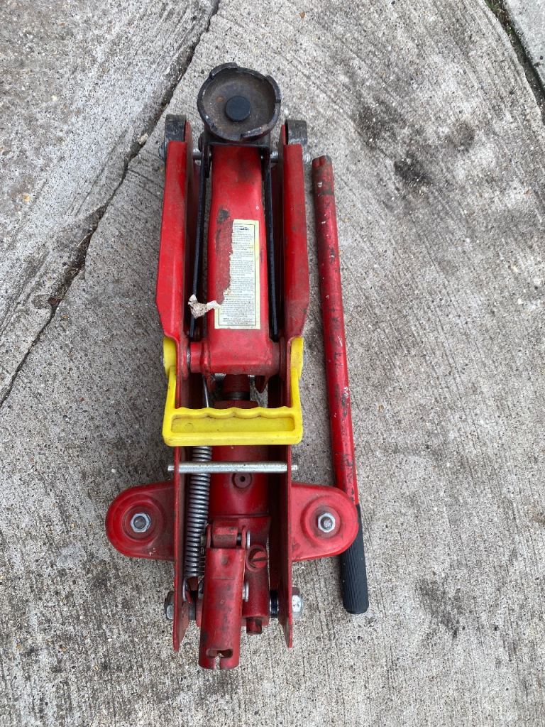 Red Hydraulic Trolley Jack – Good Condition