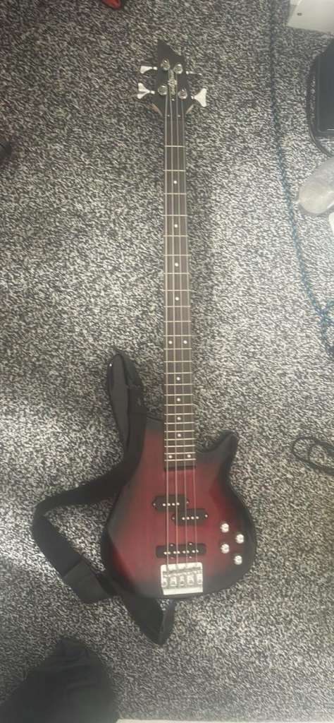Bass guitar and amplifier. 