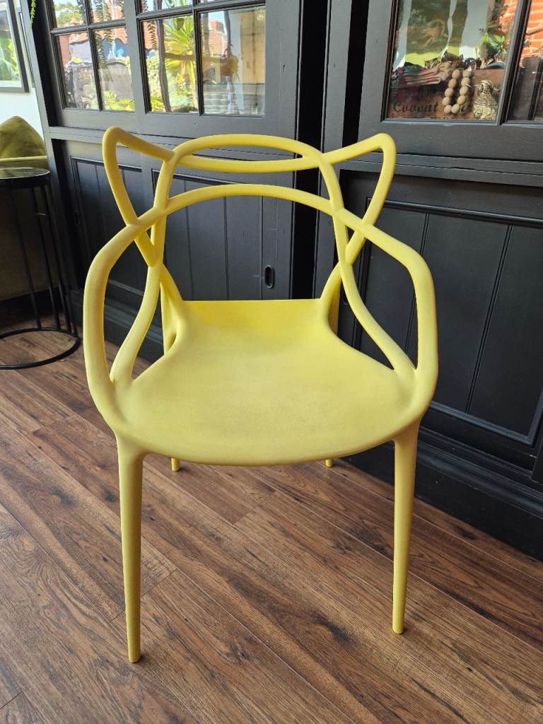 Yellow chair inspired bybthe iconic Kartell Masters chair in great used condition 