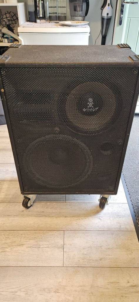 2 x loaded speaker cabinets on heavy duty castors - mono-stereo