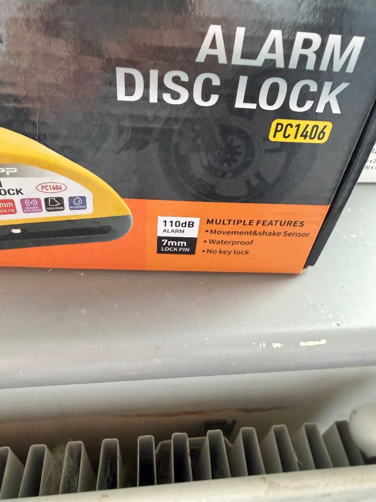 Motorbike disc alarm and lock