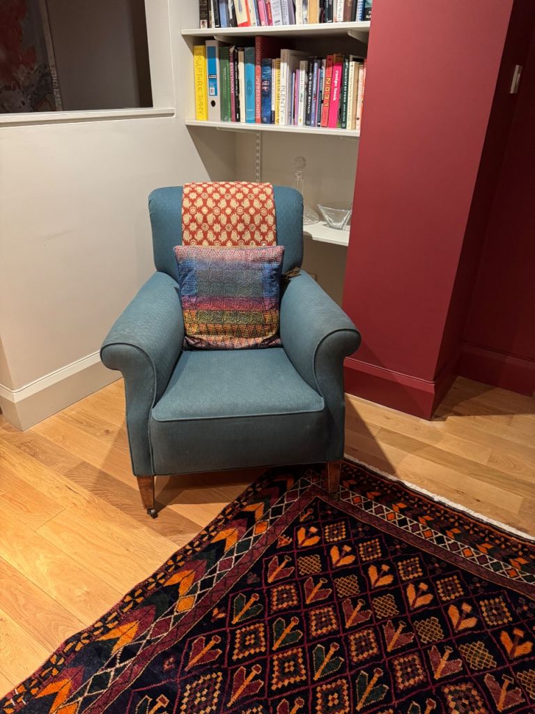 Traditional upholstered armchair