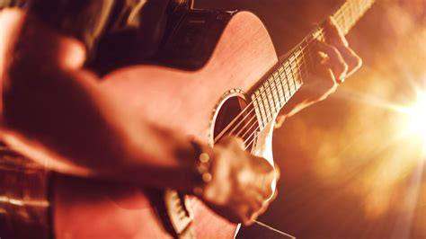 Free guitar lessons for adult beginners