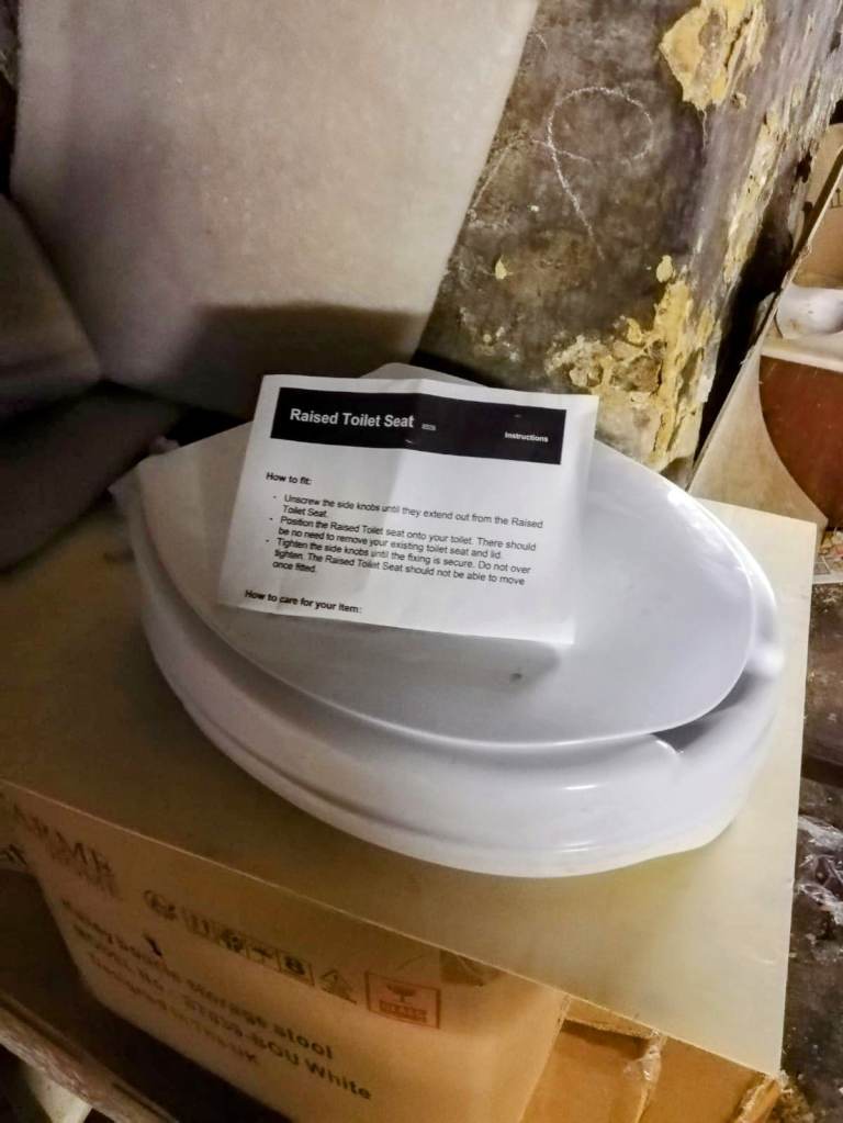 BRAND NEW WHITE RAISED TOILET SEAT