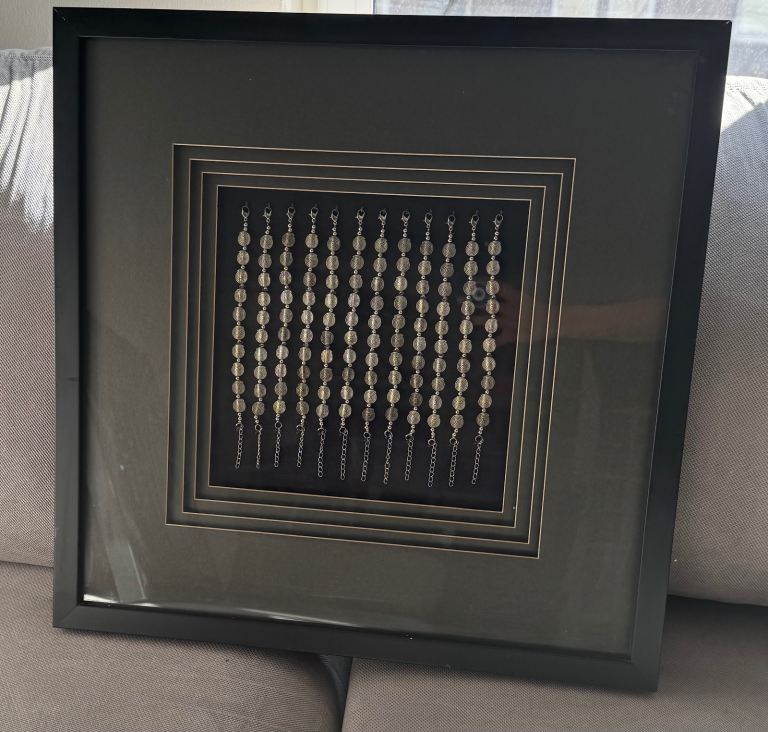 Silver jewellery wall art - Good Condition