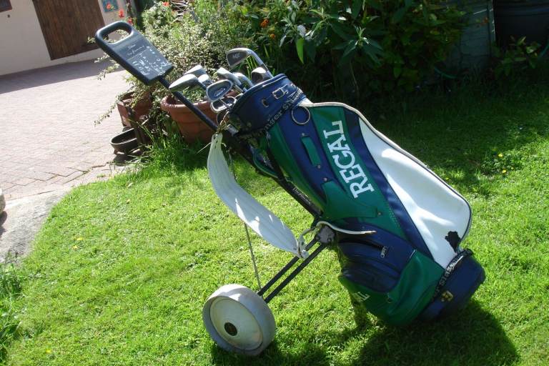golf trolley and complete set of clubs