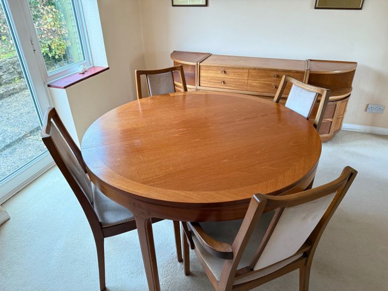 Dinning room table and Nathan Chairs