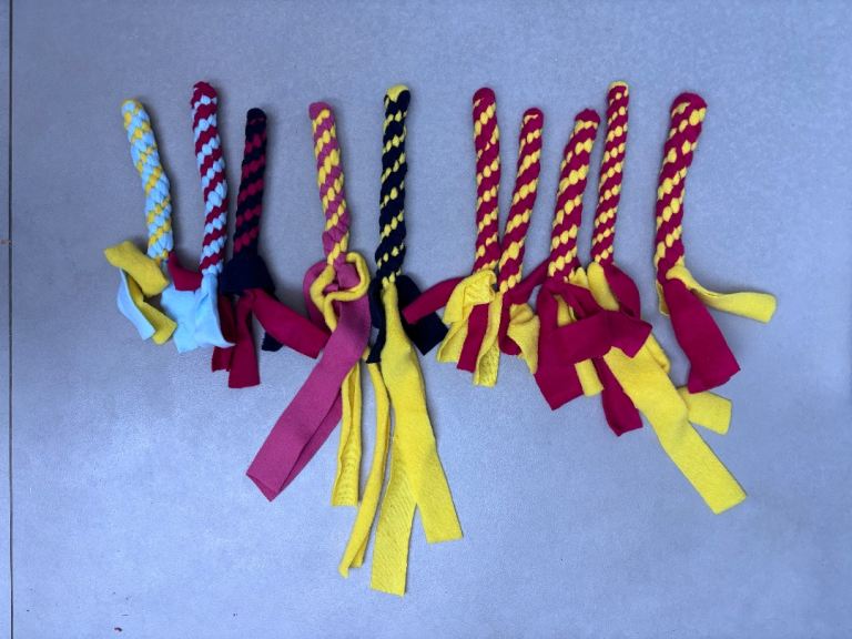 Dog soft tug toy made from multicoloured fleece (15cm) - sold individually or as job lot