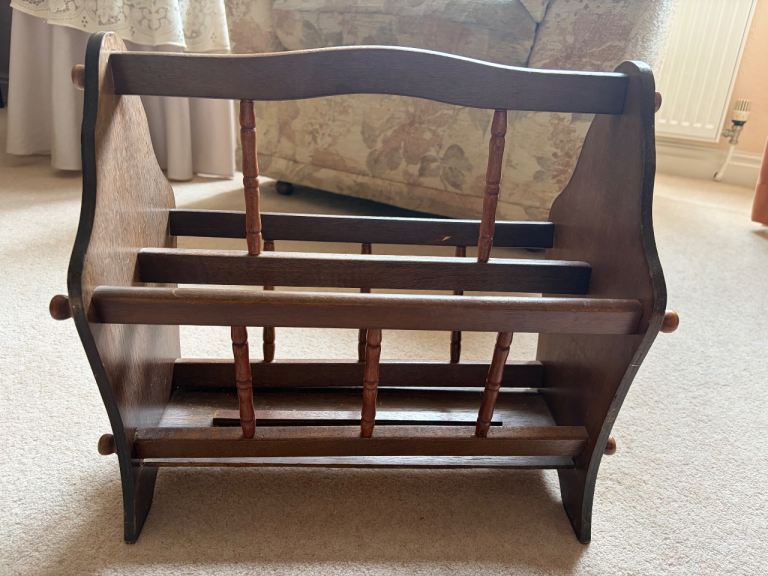 Dark wood magazine rack