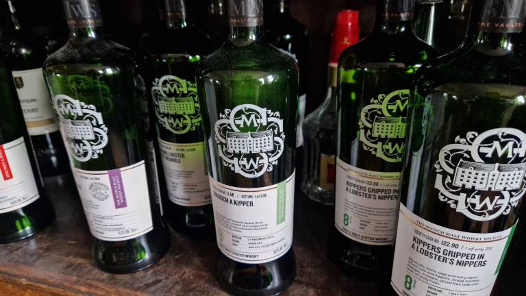 Green Glass Bottles with Unique Labels – Decorative