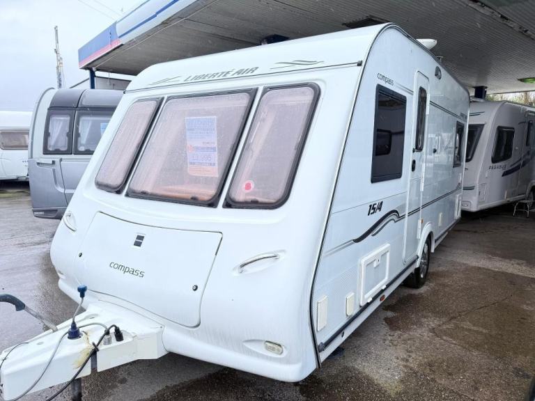 2006 COMPASS LIBERATE AIR 15/4 4 Berth fixed bed, motor mover