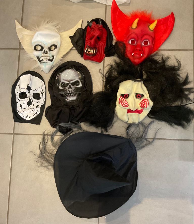 image for Halloween masks and a witches hat 