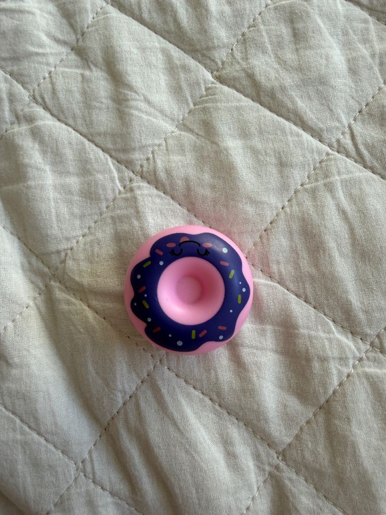 Cute Pink Donut Toy with Purple Icing and Sprinkles