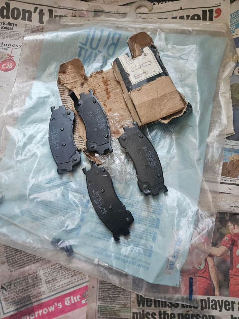 mazda 626 x reg brand newfront brake pads & hand brake adjuster