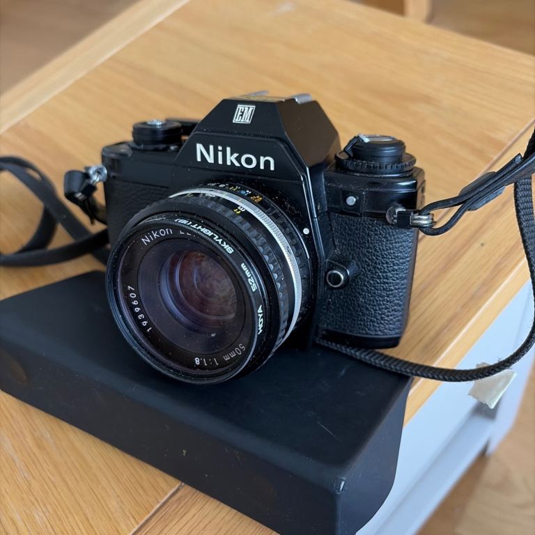 Nikon EM 3mm SLR camera With 50mm F/1.8 Nikon pancake lens 