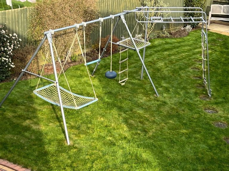 Swing, climbing frame and monkey bar set