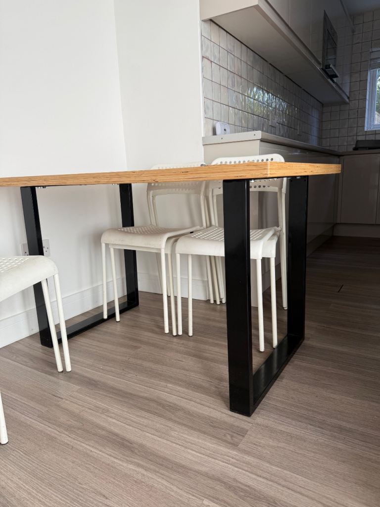 Wooden Dining Table with Black Metal Legs – Good Condition