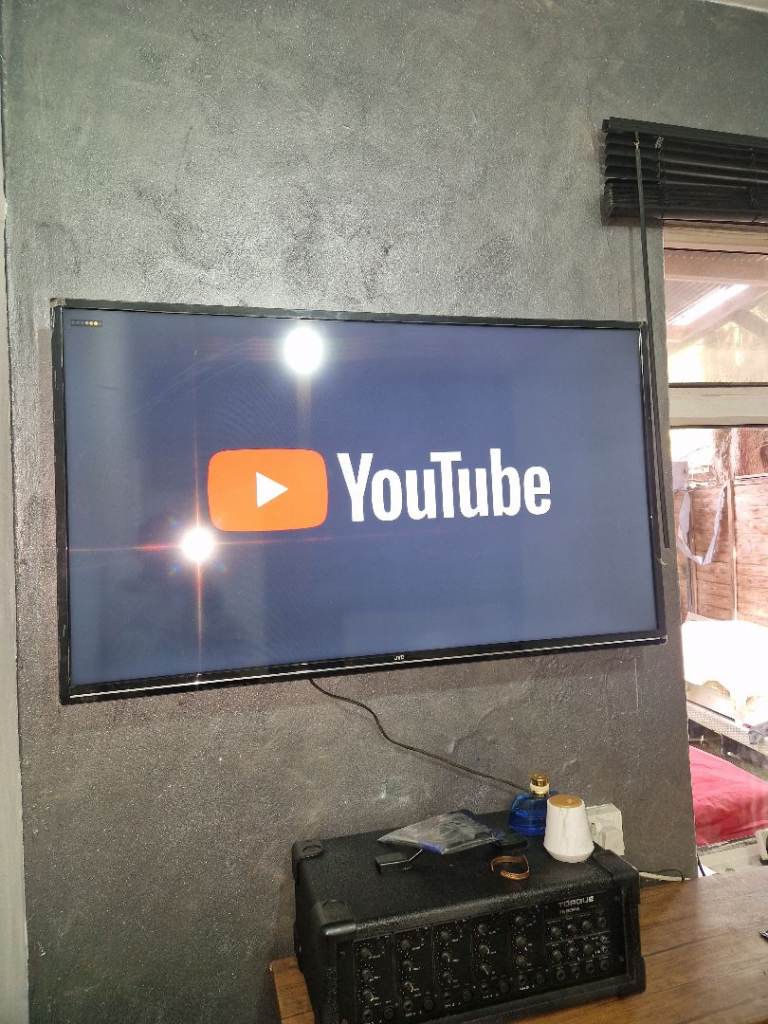 Flat Screen TV – Good Condition, Wall Mounted