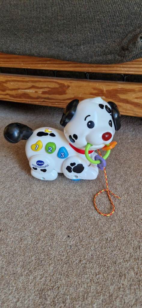 VTECH PULL ALONG PUPPY PAL. INCLUDES BATTERIES. EXCELLENT CONDITION.