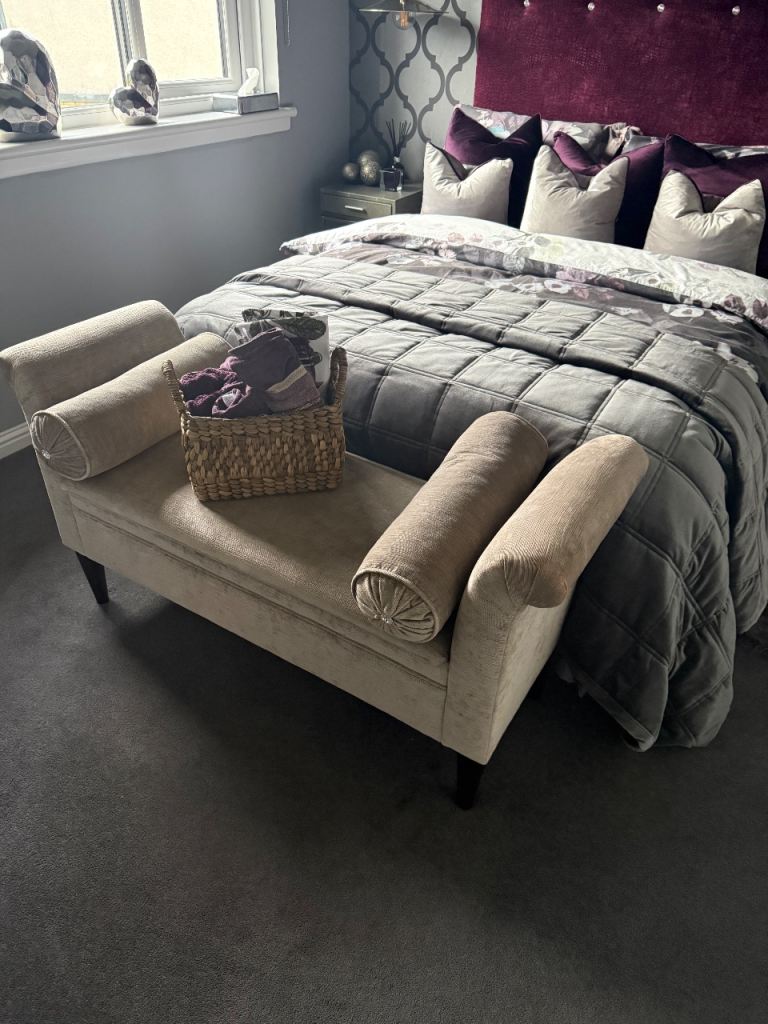 Grey bedroom storage seat/ bench with boulder cushions 
