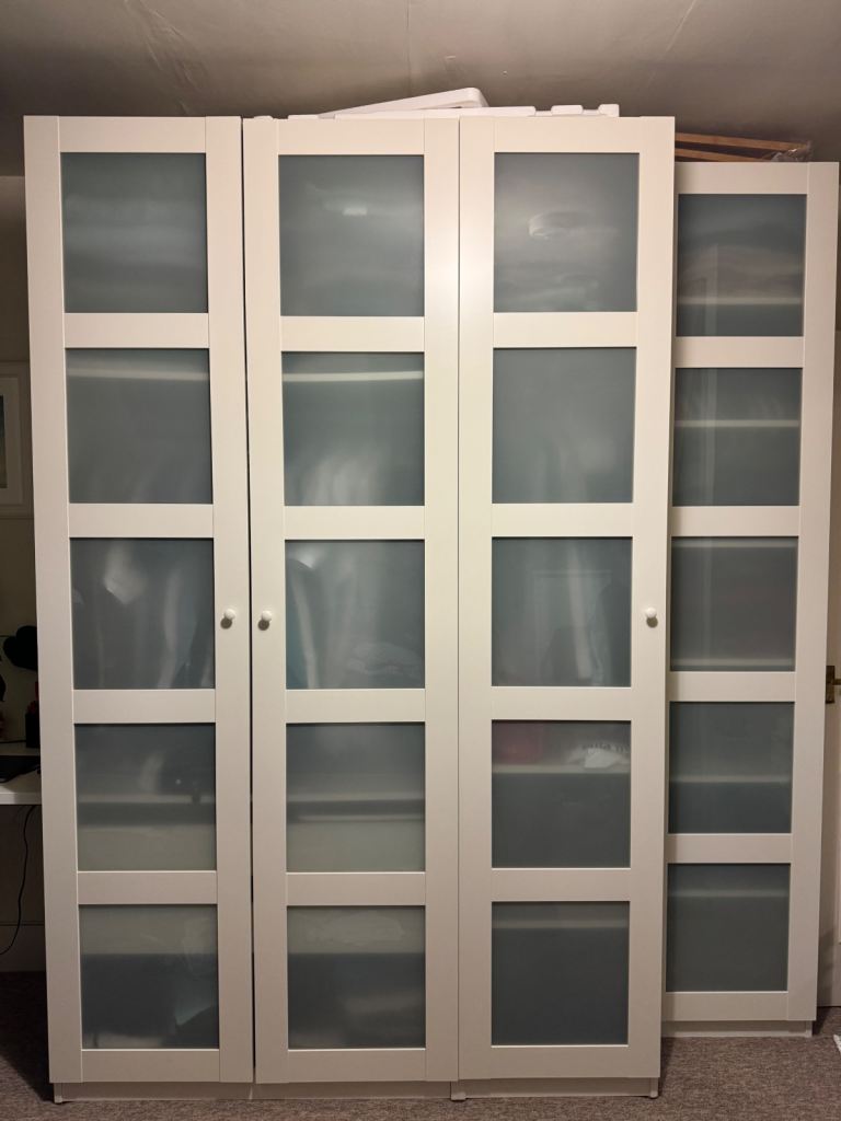 Four Ikea Pax wardrobe glass doors Bergsbo