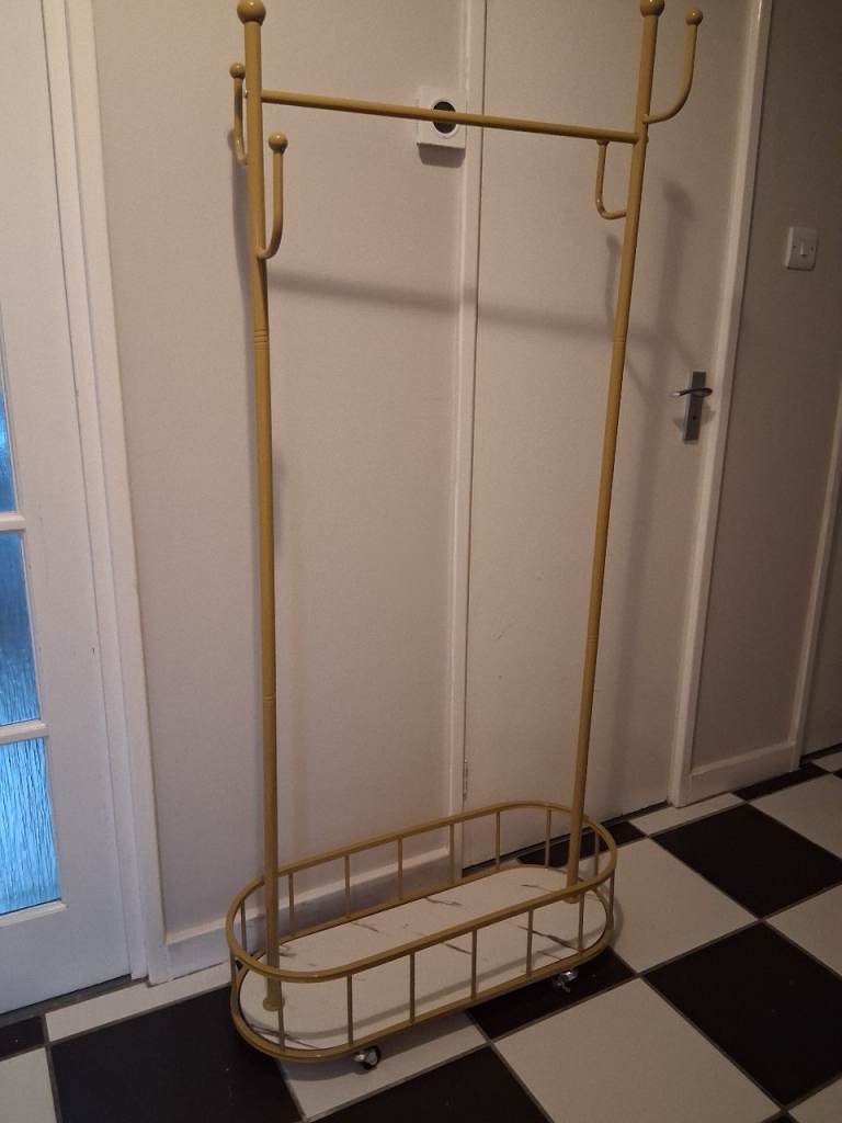 Yellow Metal Hanging Clothes Rail with Storage Basket on Wheels