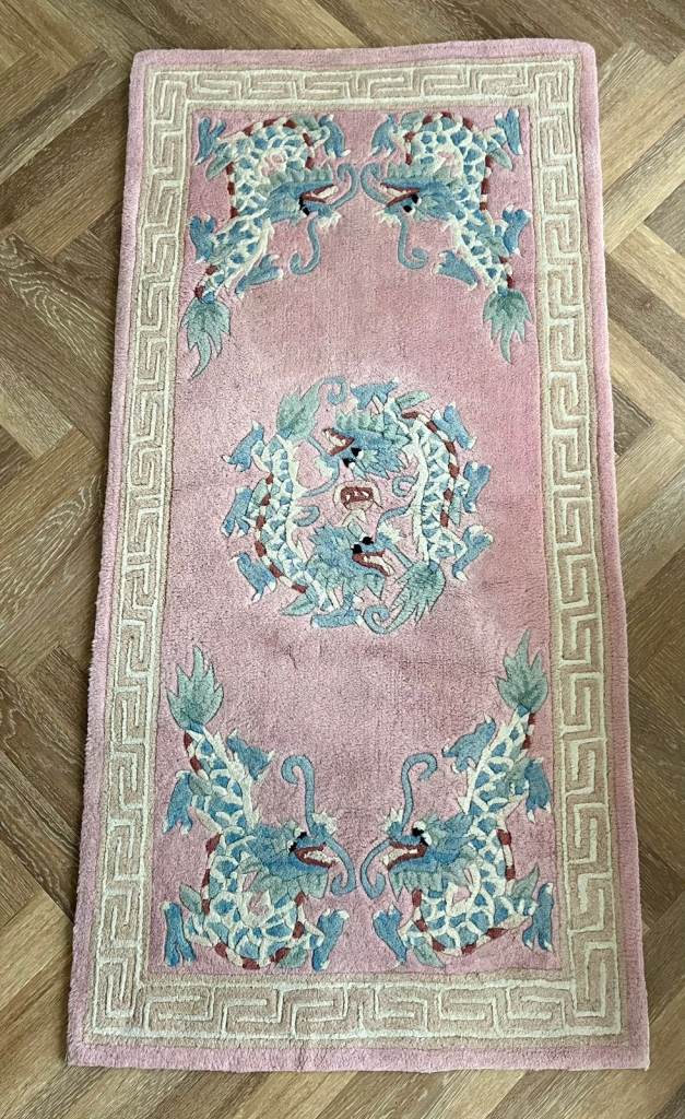 Decorative Pink Rug with Dragon Design