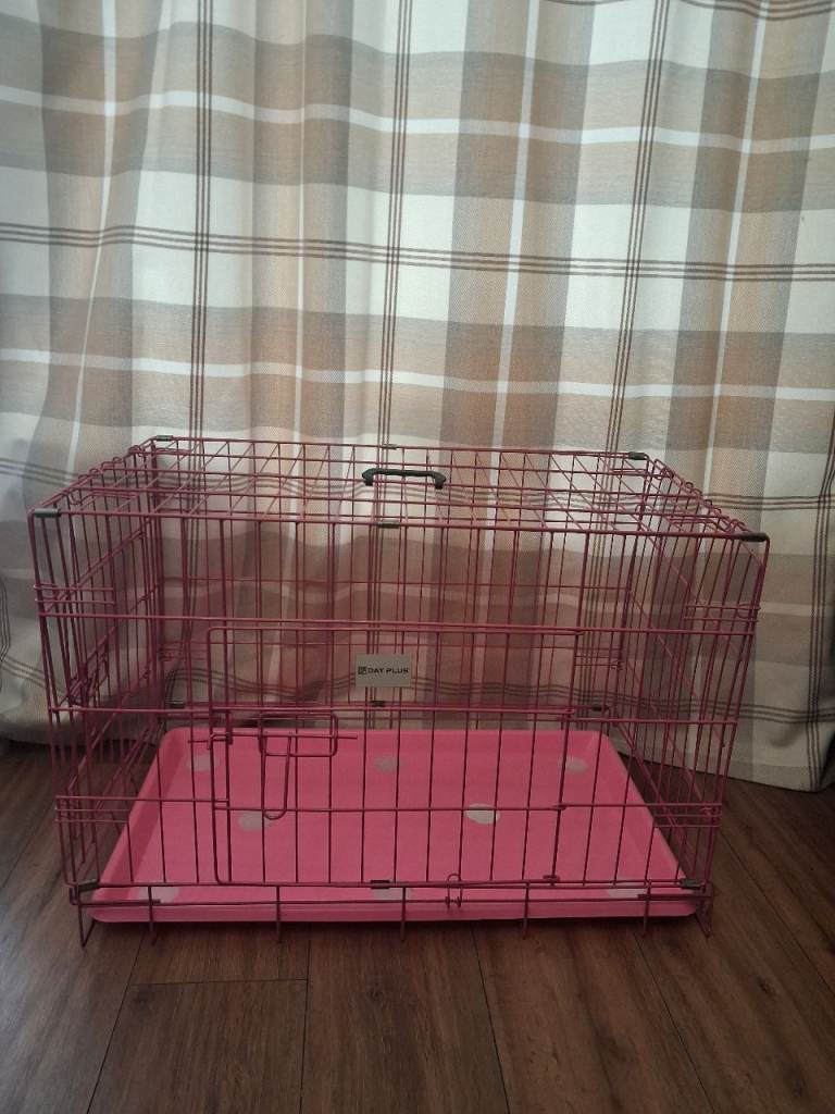 Pink dog crate 