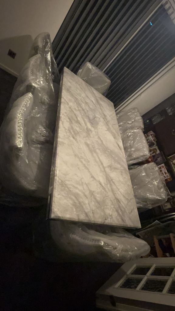 Marble top dining table (Seats 8)