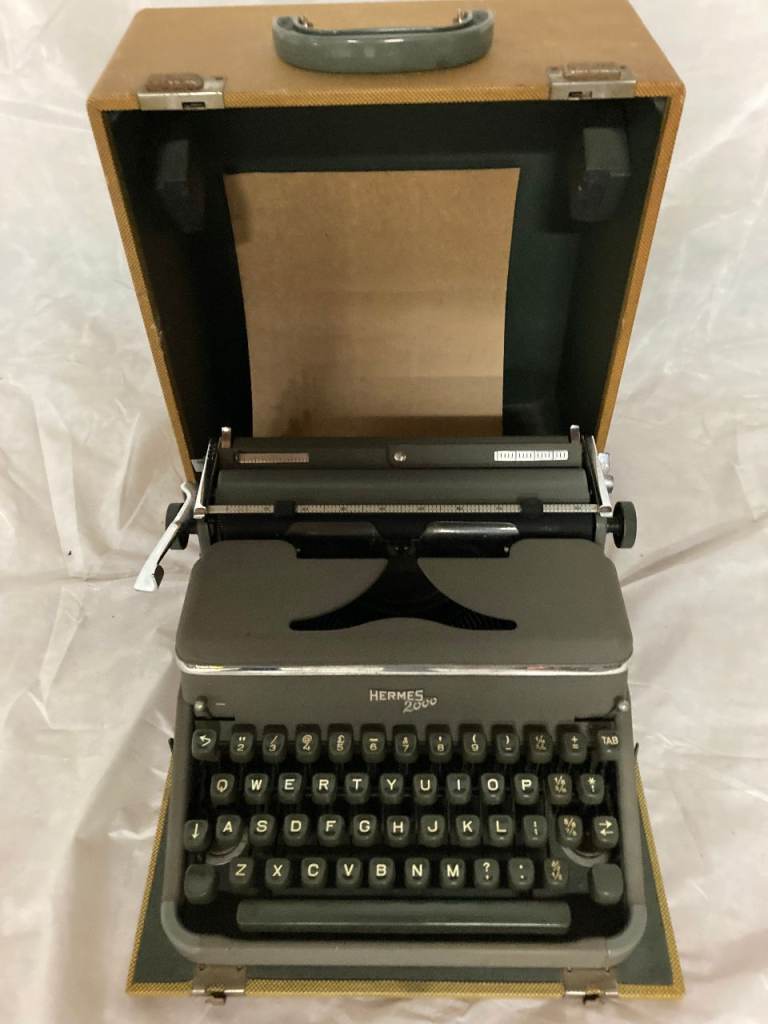 Vintage 1954 Hermes 2000 Typewriter in case.