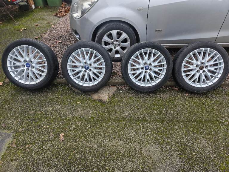 Ford focus 17in alloy wheels and tyres set 4 pcd108 fitment 5 stud in  titanium 