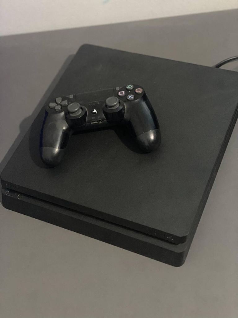 Sony PlayStation 4 with Controller – Good Condition
