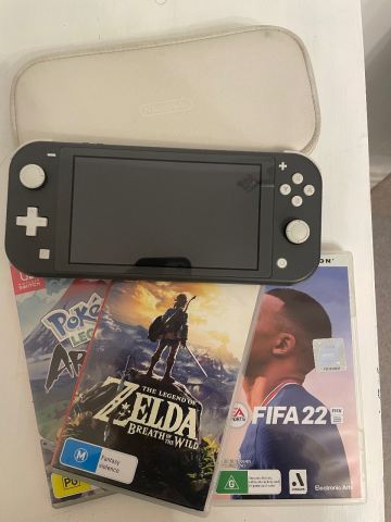 Nintendo Switch Lite + Zelda/PLA/FIFA 22 | in Kendal, Cumbria