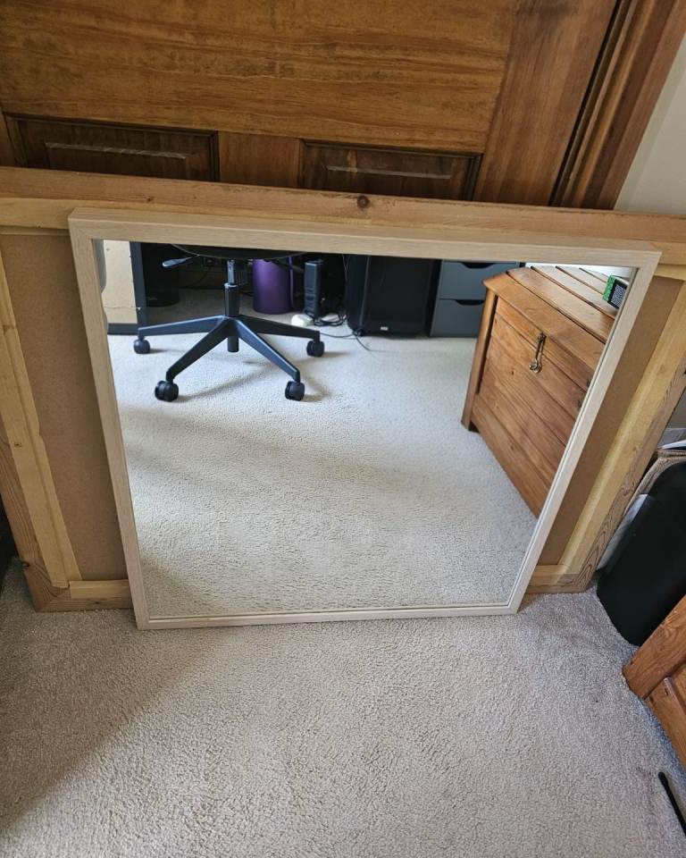 Mirror with oak effect border
