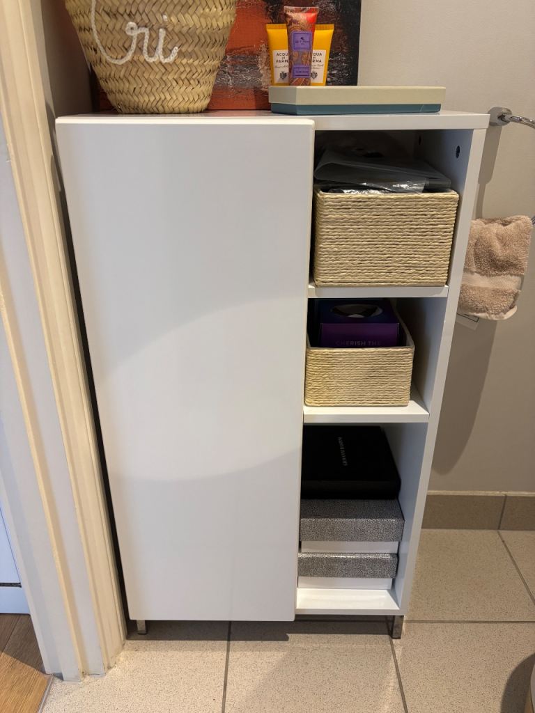 NEEDS TO GO - Cozy White Bathroom Storage Unit with Shelves and Cupboard
