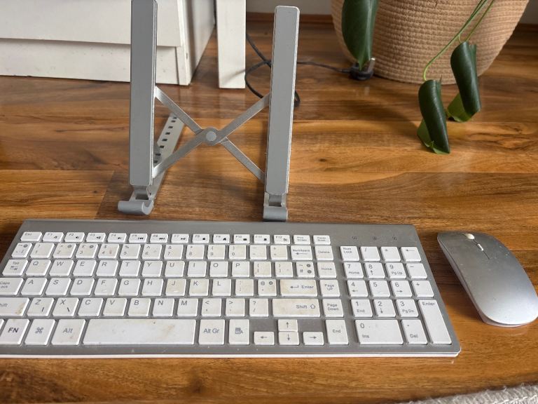 Wireless keyboard, mouse and adjustable laptop stand