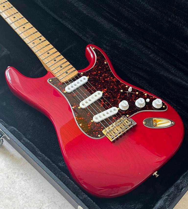 Fender Deluxe Stratocaster guitar. Seymour Duncan pickups and signed by 2 of The Shadows.