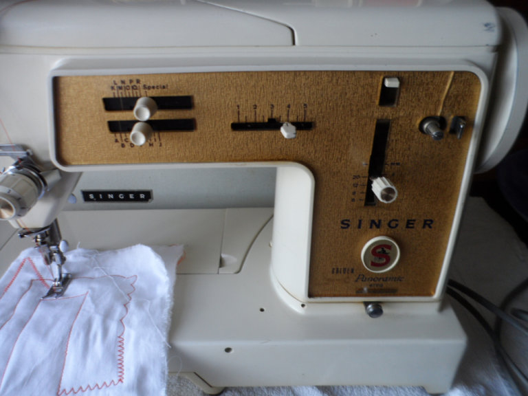 singer electric sewing machine model panoramic 670g