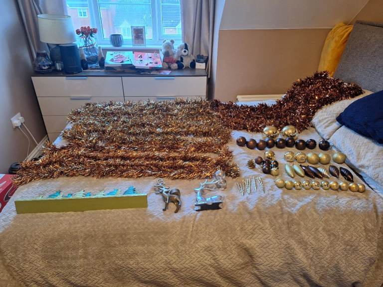 A bundle of christmas decorations tinsel x 9 brown and gold  baubles and ornaments 