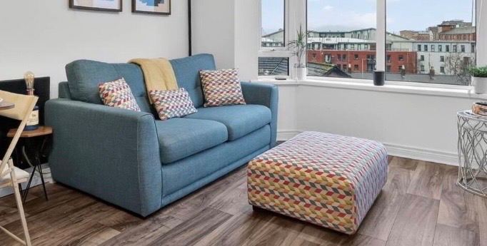 DFS Kian 3-Seater Sofa + Footstool & Cushions – Excellent Condition