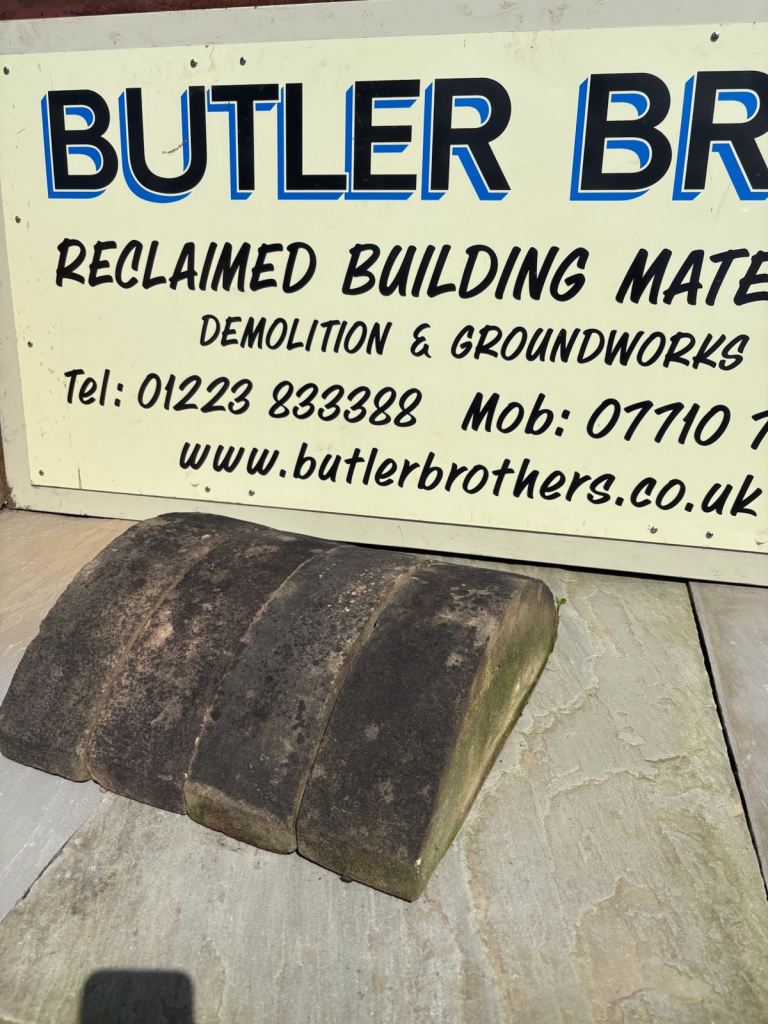 RECLAIMED sandstone half round coping stone