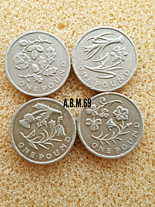 Old 1 pound coins set of  4 .national flowers .