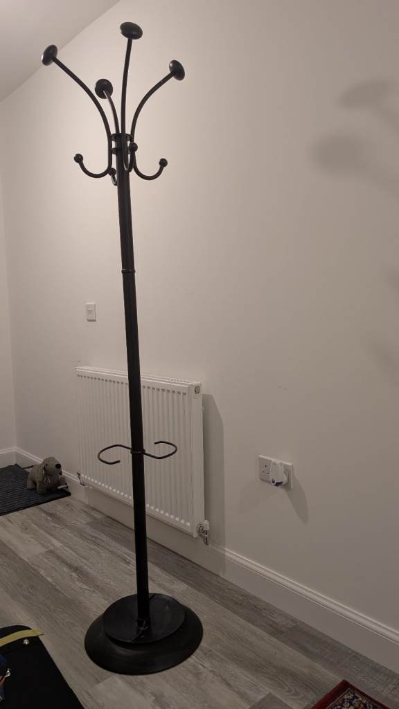 Black metal coat stand