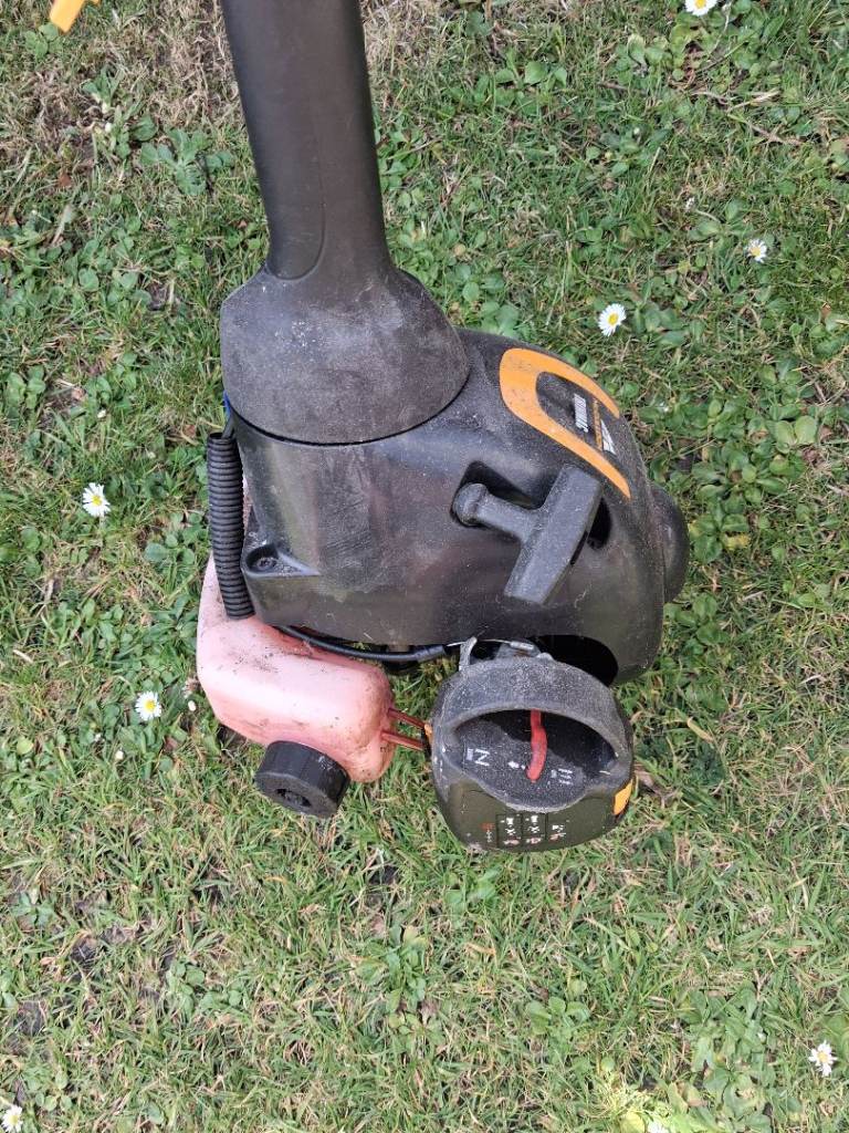 Petrol grass strimmer