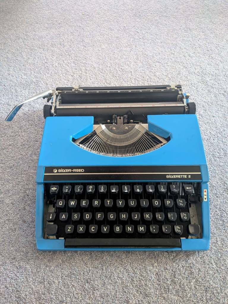 Vintage Silver Reed Silverette II Blue Typewriter in Carry Case