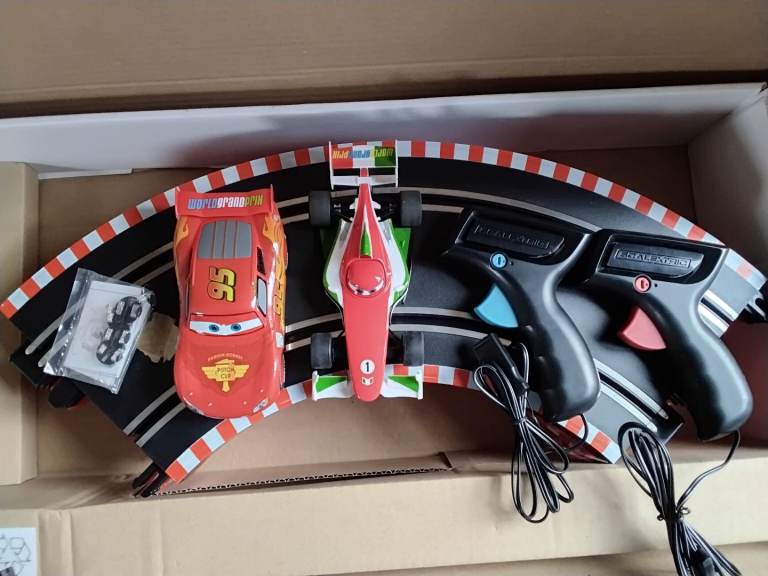 Scalextric - Disney Pixar Cars 2. 1:32 scale slot racing, World Grand Prix.