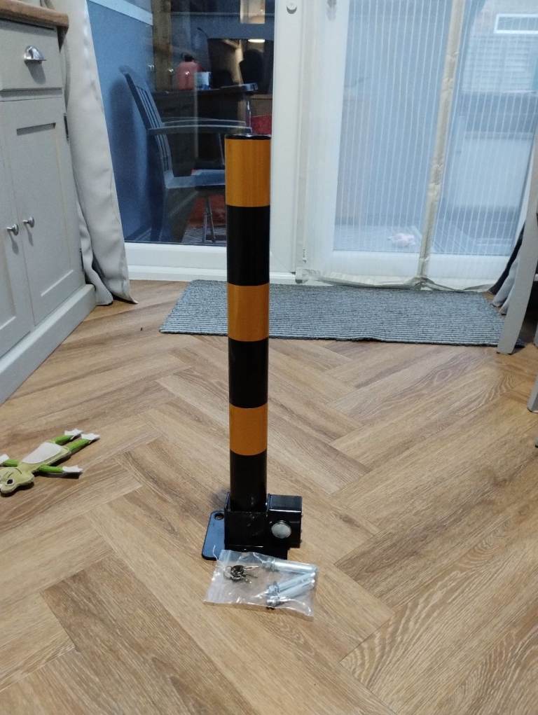 Driveway fold down security pole 