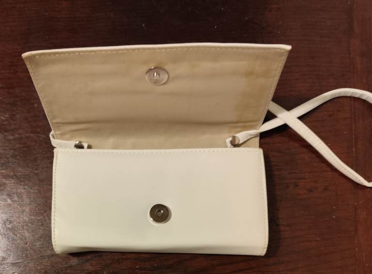 A fashionable and elegant women's leather handbag - a crossbody clutch for special occasions