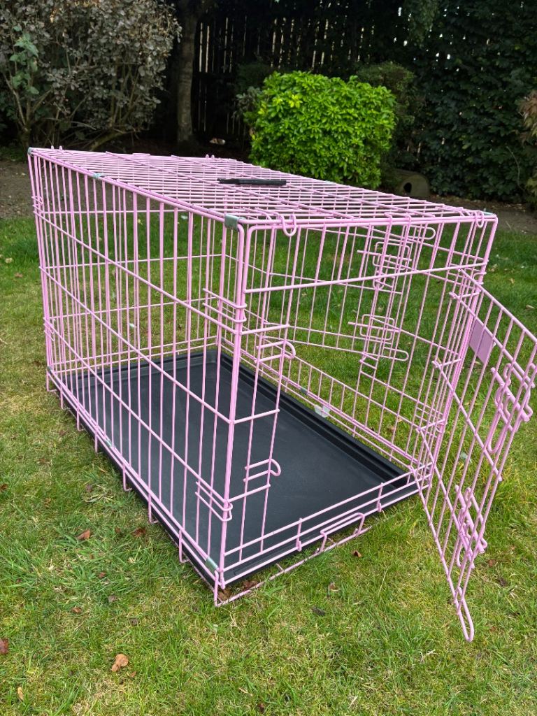 Pink dog crate