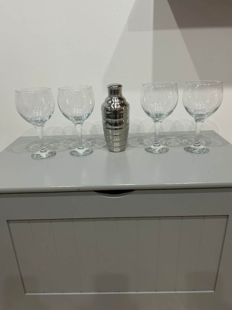 4 Large Glasses and a cocktail shaker 